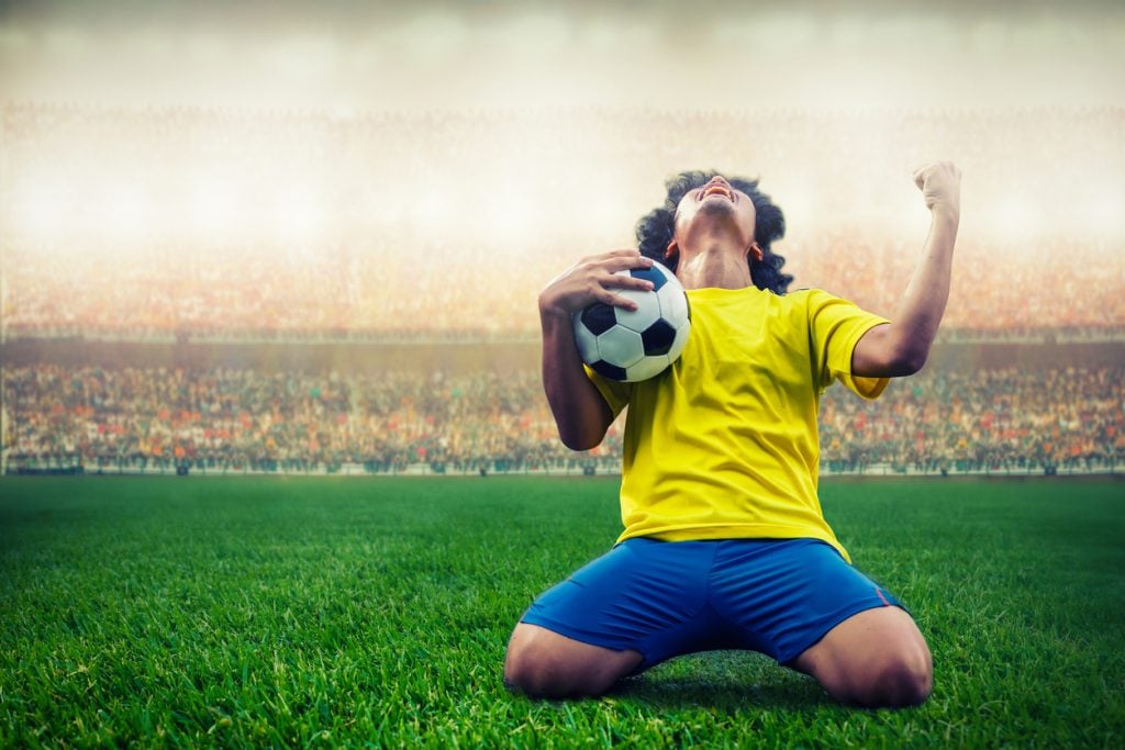 Seleção Brasileira: jogador celebrando um gol (iStock).